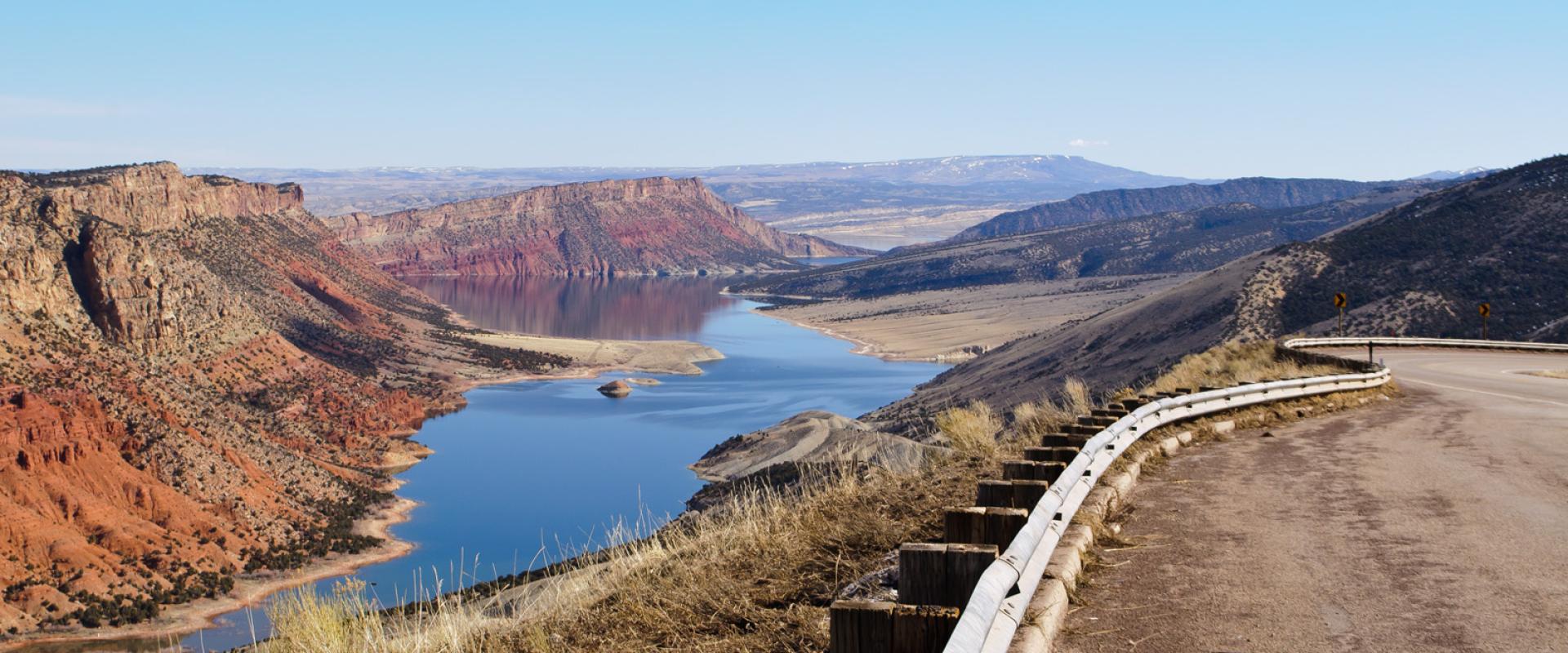 Flaming Gorge Reservoir among red cliffs