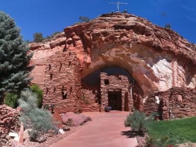 Entrance to Moqui Cave in red sandstone