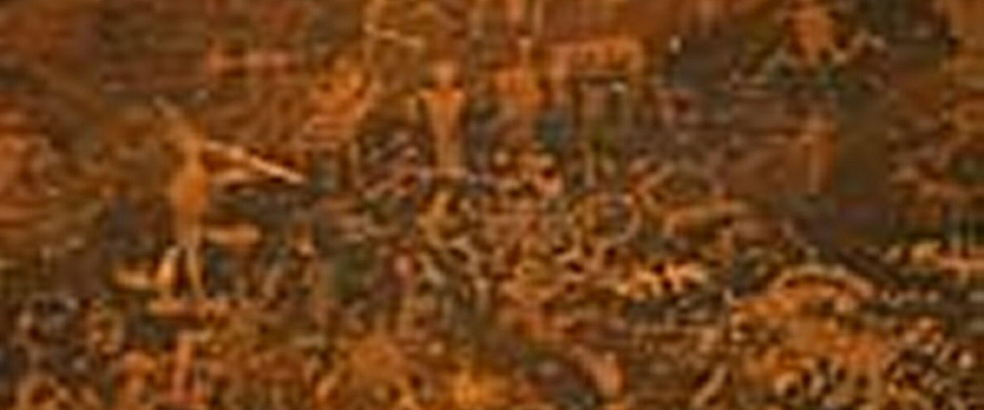 The image displays a close-up, low-light view of a rock surface covered in petroglyphs, featuring stylized anthropomorphic and zoomorphic figures, along with a distinct, large, light-colored geometric shape (possibly a ladder or grid) superimposed or